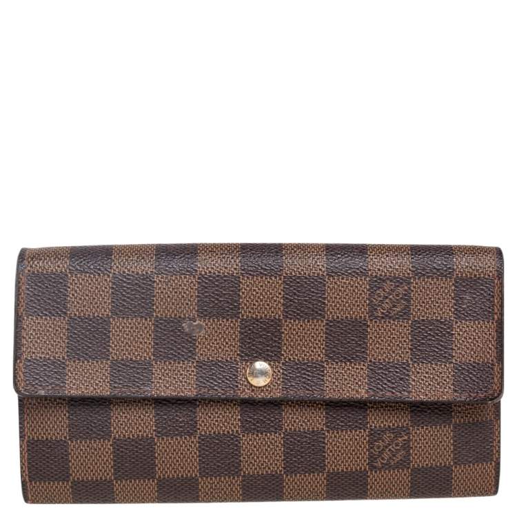 Louis Vuitton Dark Brown Leather Monogram Embossed Bifold Wallet Louis  Vuitton | The Luxury Closet