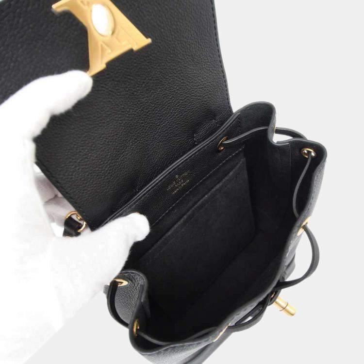 Pre Owned Louis Vuitton Black Grained Calf Leather Lockme Backpack 
