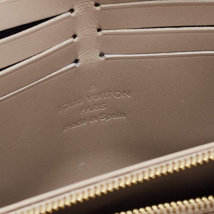 Pre Owned Louis Vuitton Grey Suhali Leather Zip Around Wallet