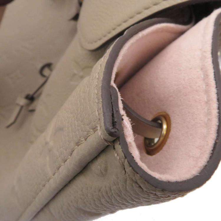 Pre Owned Louis Vuitton Beige Monogram Empreinte Leather Montsouris PM Backpack 