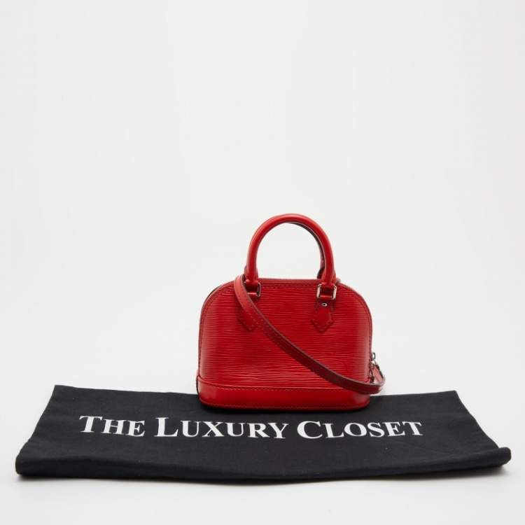 Pre Owned Louis Vuitton Red Epi Leather Alma Nano Bag 