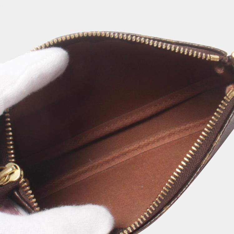 Pre Owned Louis Vuitton Brown Canvas Monogram Transatlantic Christmas Mini Pochette Accessoires Clutch Bag 