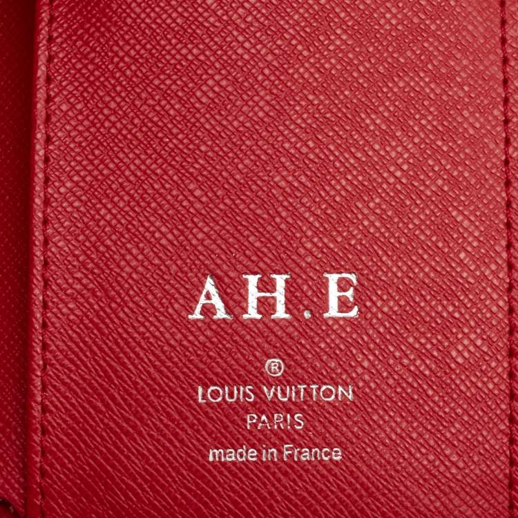 Pre Owned Louis Vuitton Coquelicot Epi Leather Twist Compact Wallet 