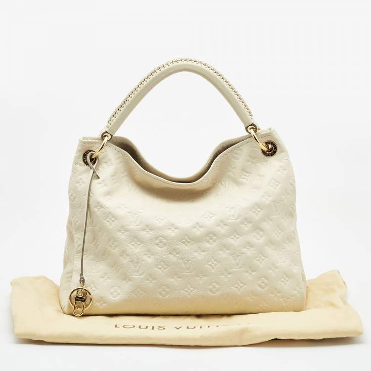 Pre Owned Louis Vuitton Neige Monogram Empreinte Leather Artsy MM Bag
