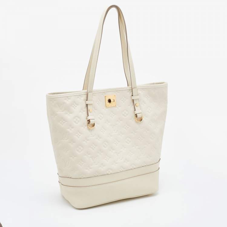 Pre Owned Louis Vuitton Neige Monogram Empreinte Leather Citadine PM Bag