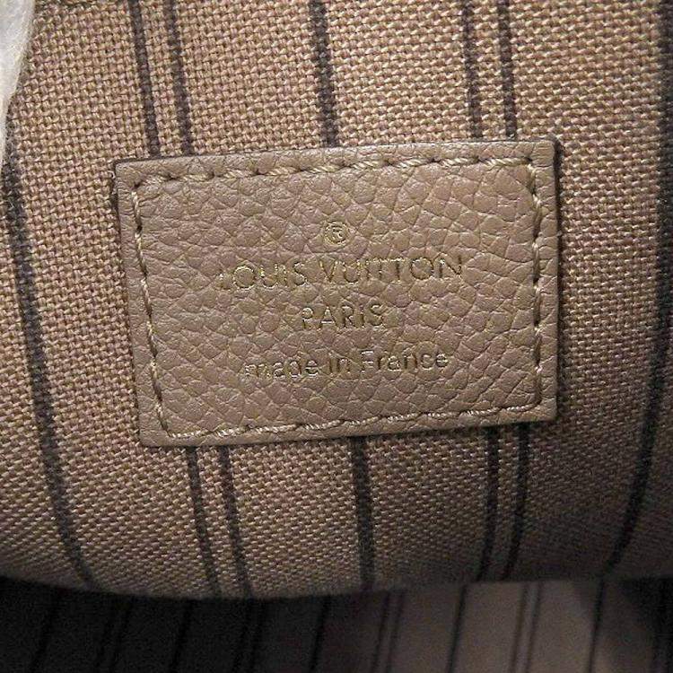مملوكة مسبقًا Louis Vuitton Beige Monogram Empreinte Leather Mazarine MM Top Handle Bag