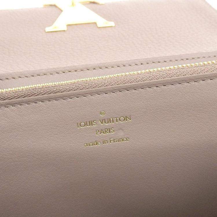 Pre Owned Louis Vuitton Grey Leather Capucines Wallet