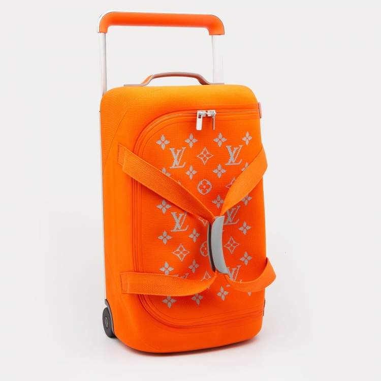 Pre Owned Louis Vuitton Orange Monogram Knit Horizon Soft 55 Duffle Bag