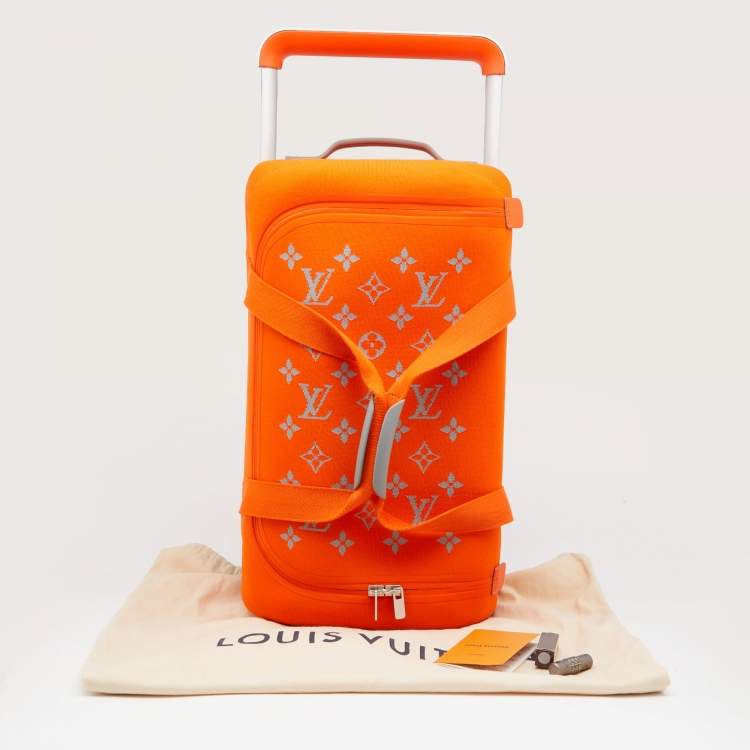 Pre Owned Louis Vuitton Orange Monogram Knit Horizon Soft 55 Duffle Bag