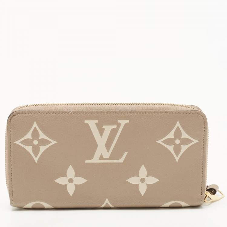 Pre Owned Louis Vuitton Tourterelle/Creme Monogram Empreinte Leather Zippy Wallet