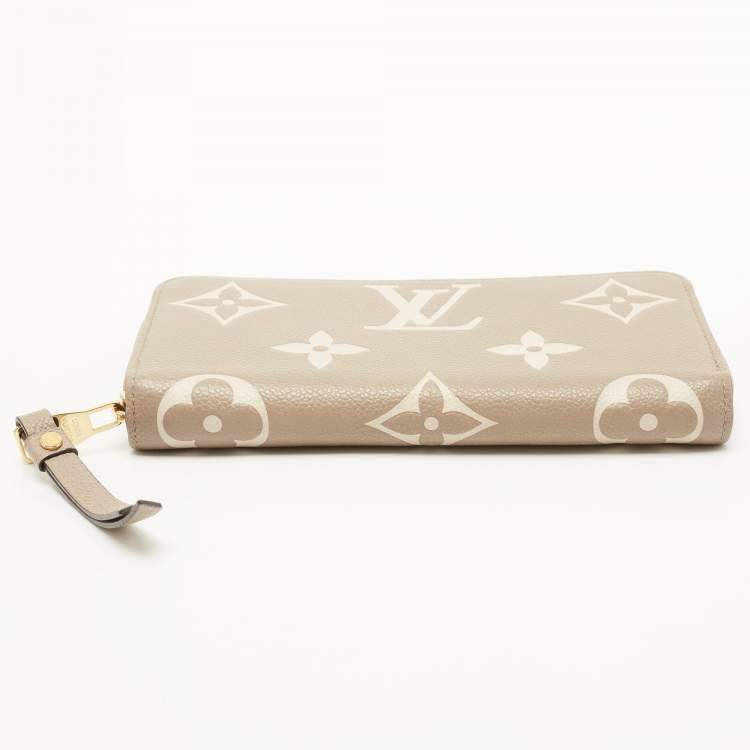 Pre Owned Louis Vuitton Tourterelle/Creme Monogram Empreinte Leather Zippy Wallet