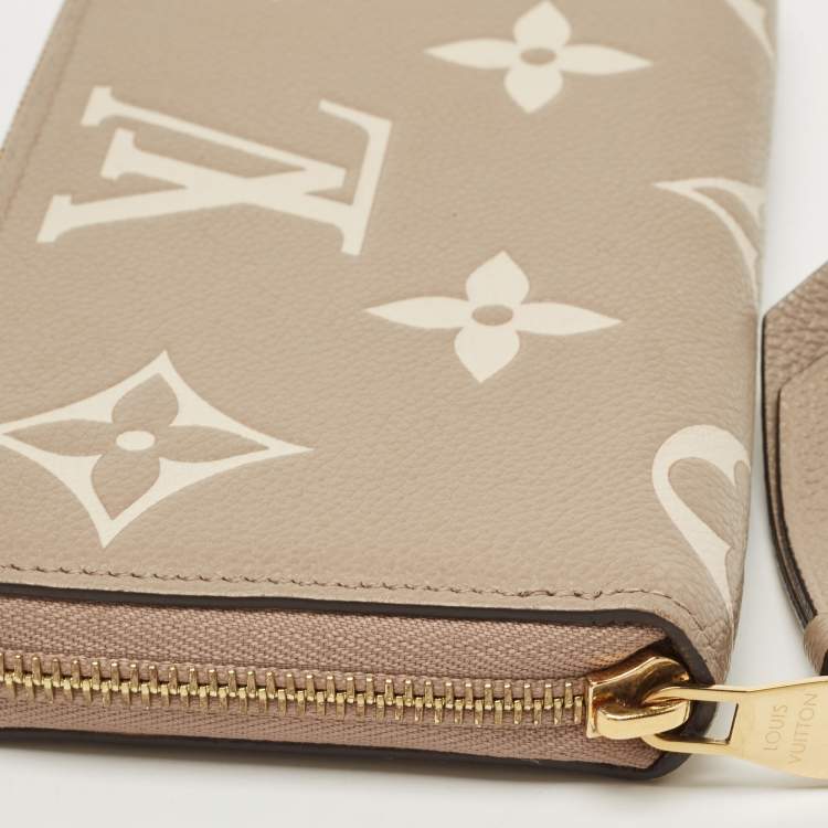 Pre Owned Louis Vuitton Tourterelle/Creme Monogram Empreinte Leather Zippy Wallet