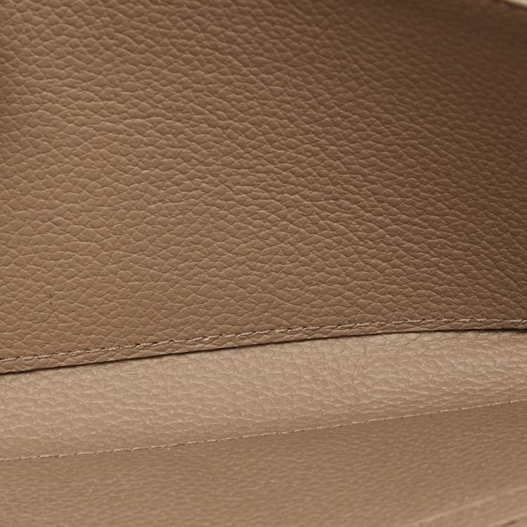 Pre Owned Louis Vuitton Tourterelle/Creme Monogram Empreinte Leather Zippy Wallet