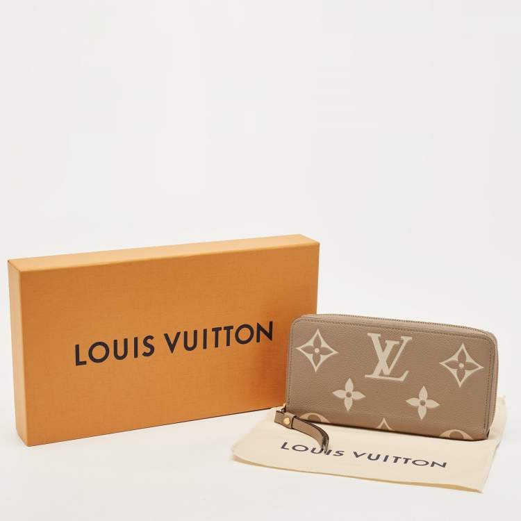 Pre Owned Louis Vuitton Tourterelle/Creme Monogram Empreinte Leather Zippy Wallet