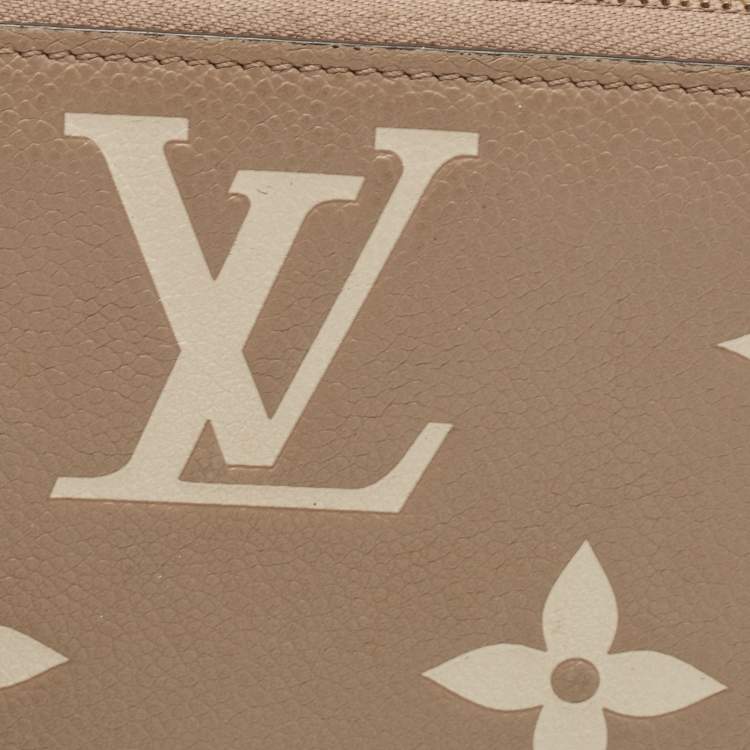 Pre Owned Louis Vuitton Tourterelle/Creme Monogram Empreinte Leather Zippy Wallet
