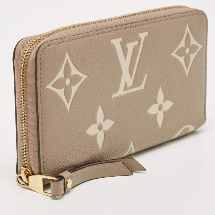 Pre Owned Louis Vuitton Tourterelle/Creme Monogram Empreinte Leather Zippy Wallet