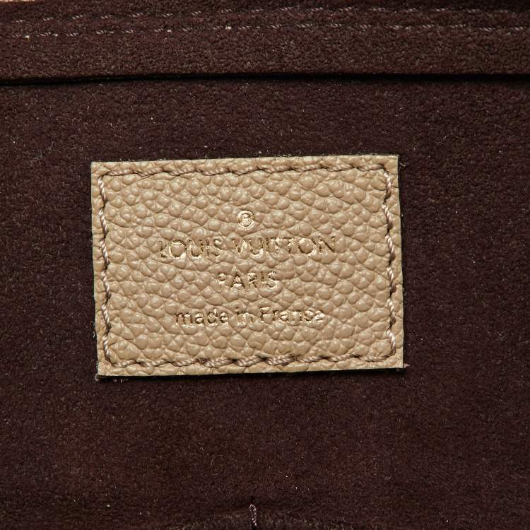 Pre Owned Louis Vuitton Tourterelle Monogram Empreinte Leather Neo Alma PM Bag