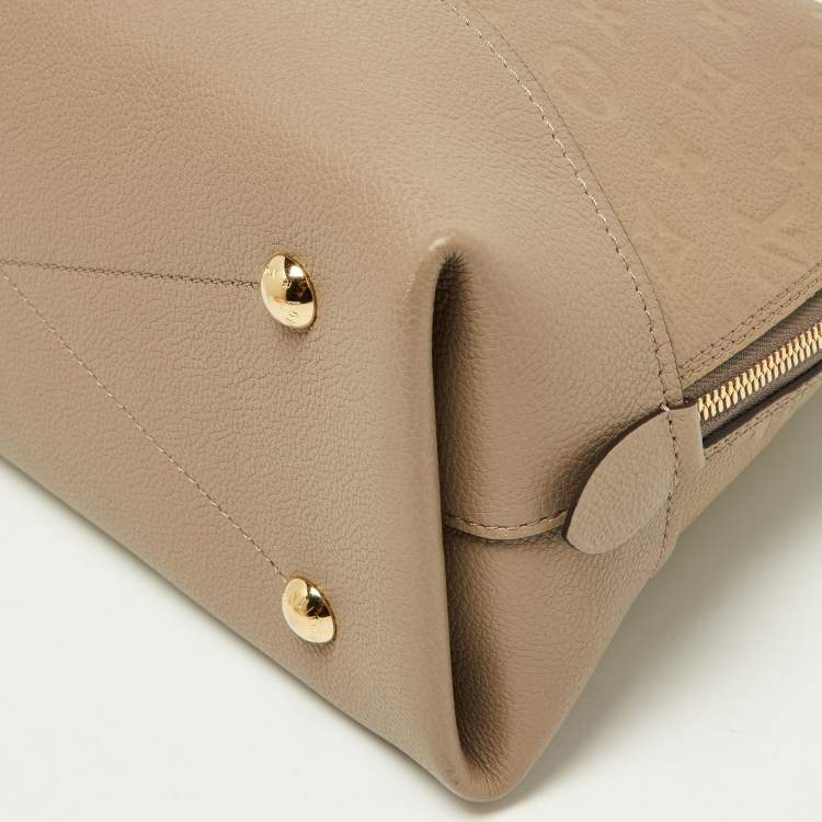 Pre Owned Louis Vuitton Tourterelle Monogram Empreinte Leather Neo Alma PM Bag