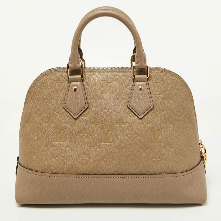 Pre Owned Louis Vuitton Tourterelle Monogram Empreinte Leather Neo Alma PM Bag