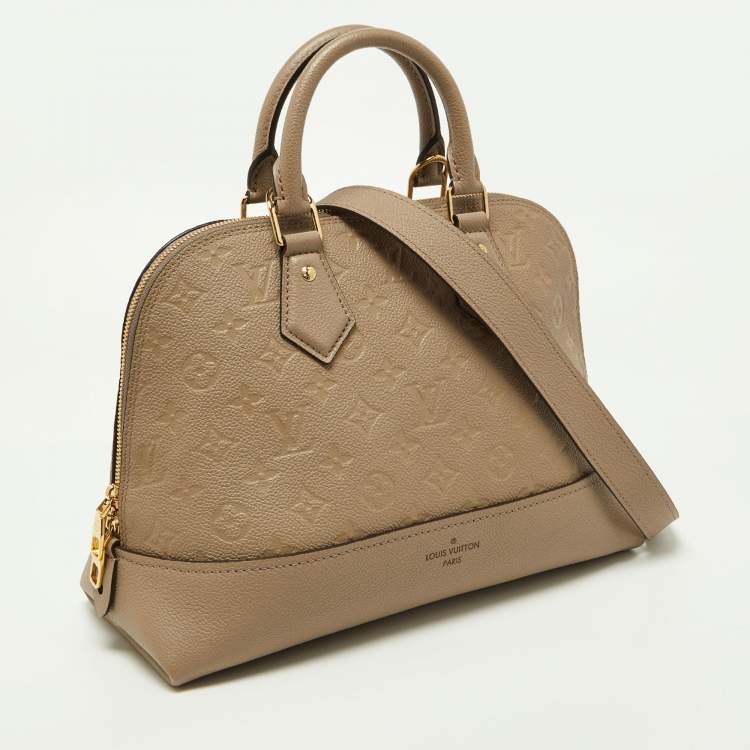 Pre Owned Louis Vuitton Tourterelle Monogram Empreinte Leather Neo Alma PM Bag