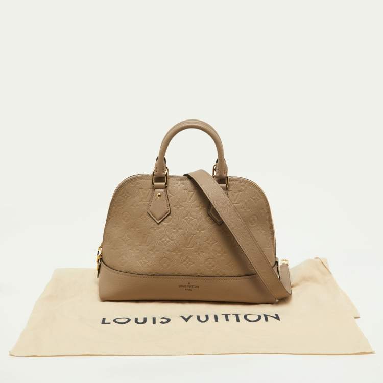 Pre Owned Louis Vuitton Tourterelle Monogram Empreinte Leather Neo Alma PM Bag