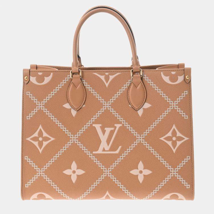 Louis Vuitton Orange Leather Monogram Empreinte Broderies Onthego