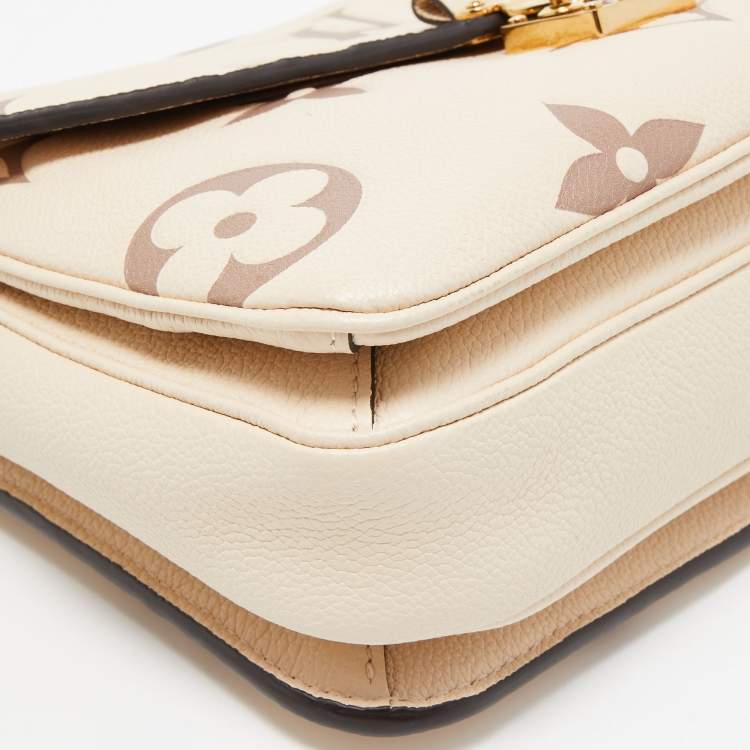 Pre Owned Louis Vuitton Creme Monogram Empreinte Leather Giant Pochette Metis Bag
