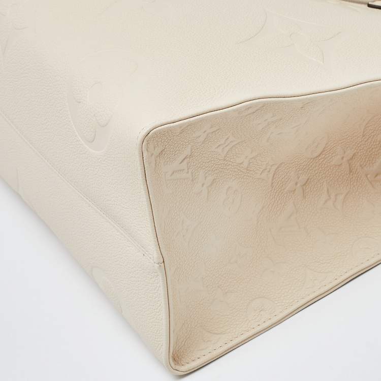 Pre Owned Louis Vuitton Creme Monogram Empreinte Leather Onthego GM Bag