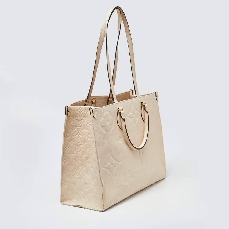 Pre Owned Louis Vuitton Creme Monogram Empreinte Leather Onthego GM Bag