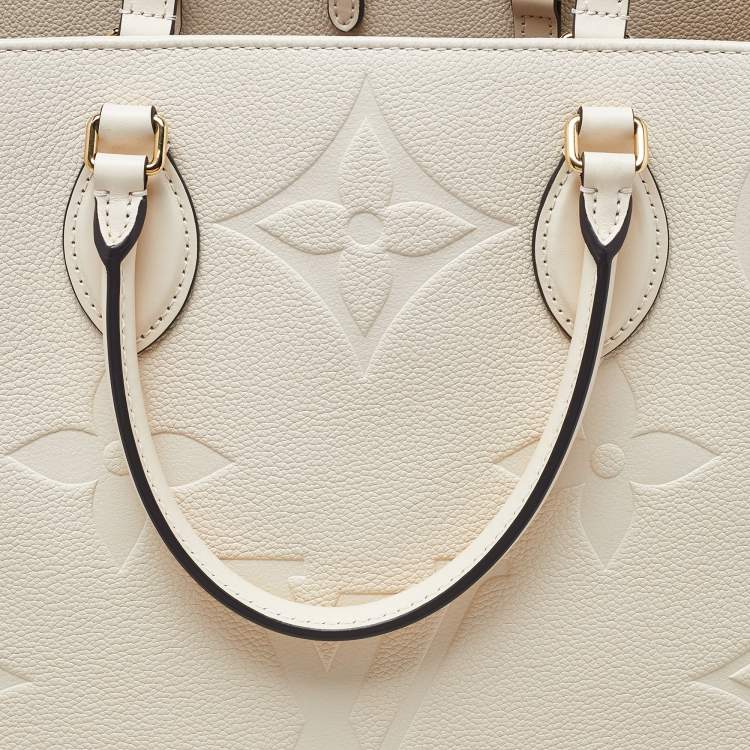 Pre Owned Louis Vuitton Creme Monogram Empreinte Leather Onthego GM Bag