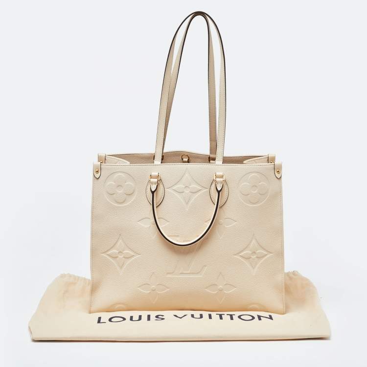 Pre Owned Louis Vuitton Creme Monogram Empreinte Leather Onthego GM Bag