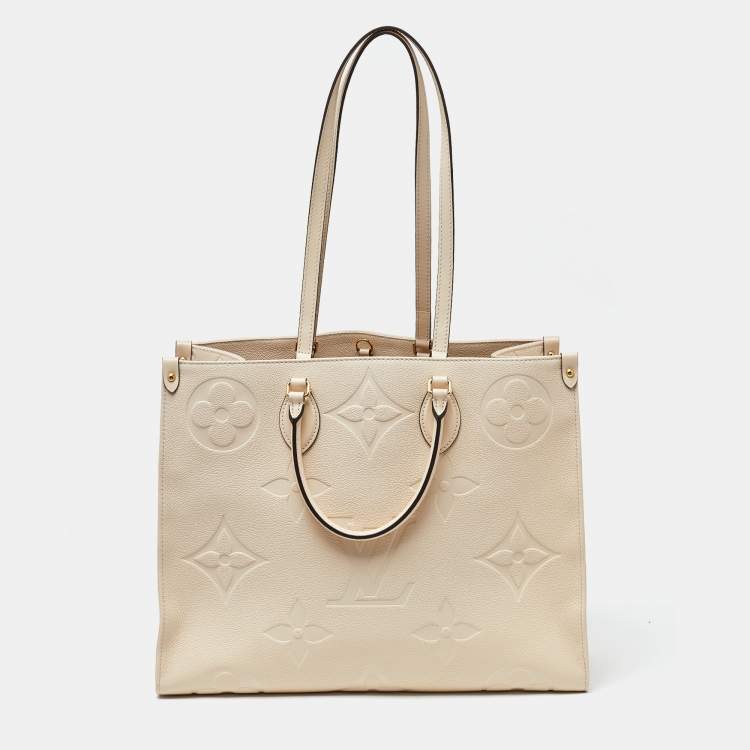 Pre Owned Louis Vuitton Creme Monogram Empreinte Leather Onthego GM Bag