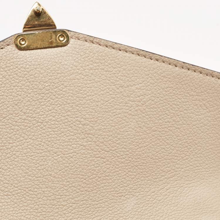 مملوكة مسبقًا Louis Vuitton Tourterelle Monogram Empreinte Leather Pochette Metis Bag