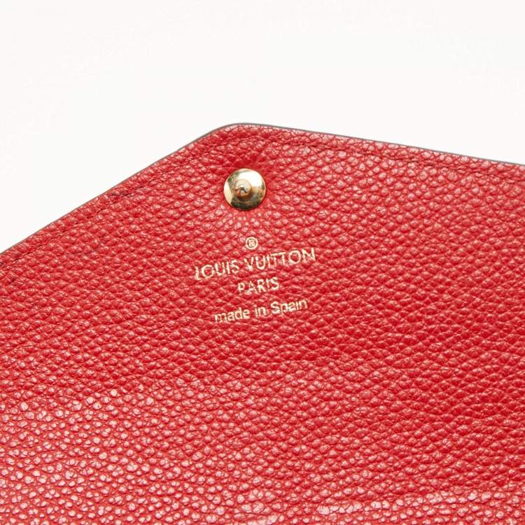 مملوكة مسبقًا Louis Vuitton Red Monogram Empreinte Leather Sarah Wallet