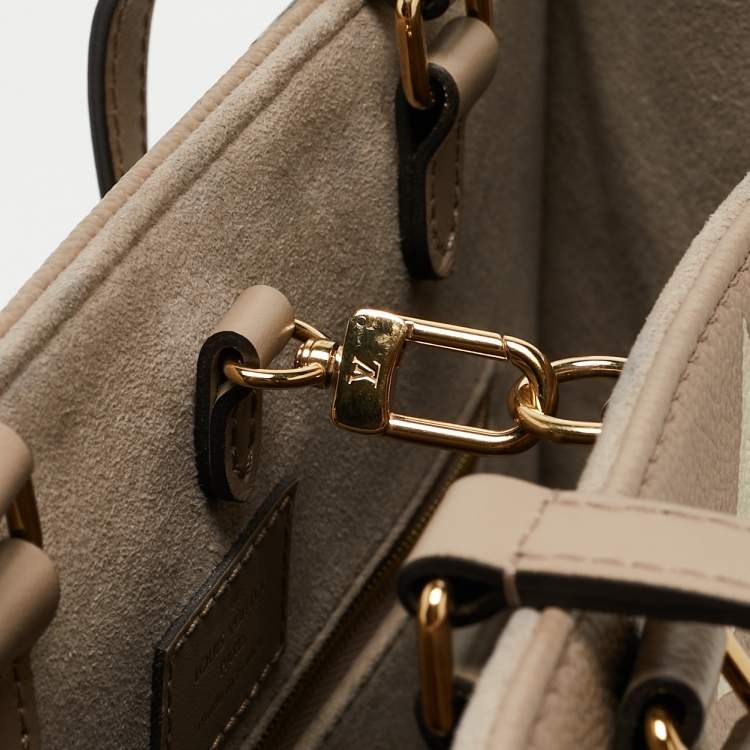 Pre Owned Louis Vuitton Bicolor Monogram Empriente Leather Giant Onthego MM Bag