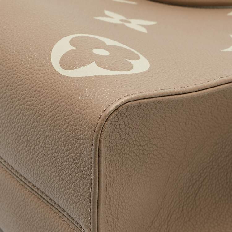 Pre Owned Louis Vuitton Bicolor Monogram Empriente Leather Giant Onthego MM Bag