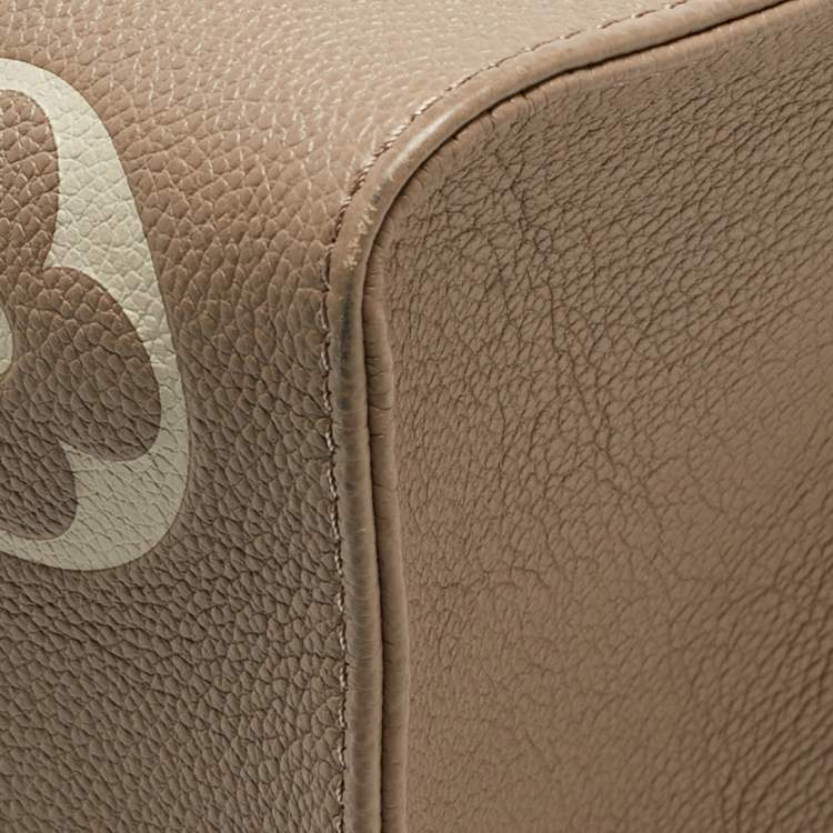 Pre Owned Louis Vuitton Bicolor Monogram Empriente Leather Giant Onthego MM Bag