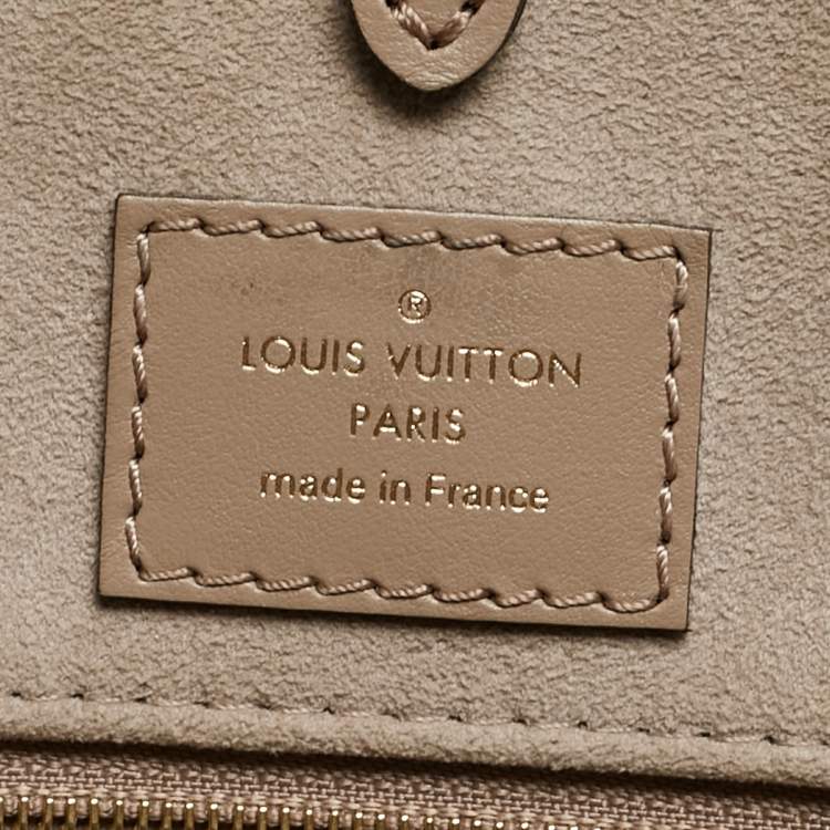 Pre Owned Louis Vuitton Bicolor Monogram Empriente Leather Giant Onthego MM Bag