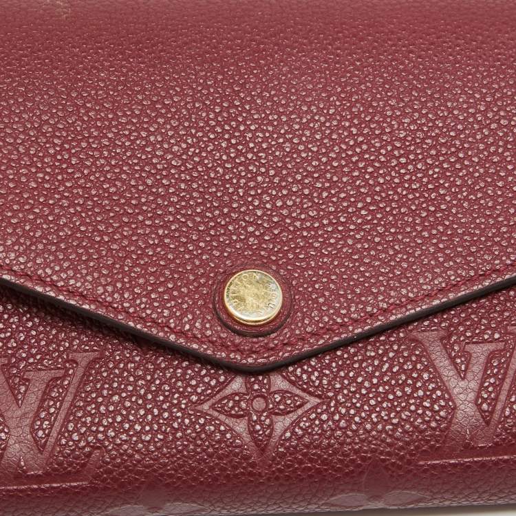 Pre Owned Louis Vuitton Flamme Monogram Empreinte Leather Sarah Wallet