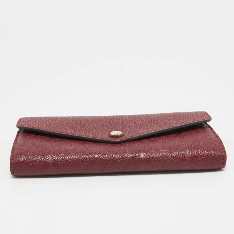 Pre Owned Louis Vuitton Flamme Monogram Empreinte Leather Sarah Wallet