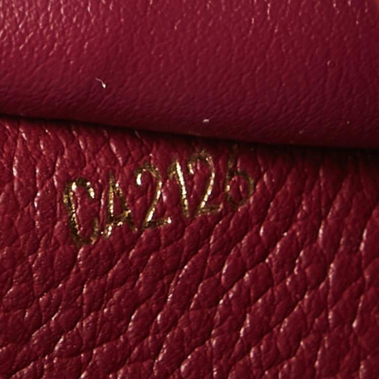 Pre Owned Louis Vuitton Flamme Monogram Empreinte Leather Sarah Wallet