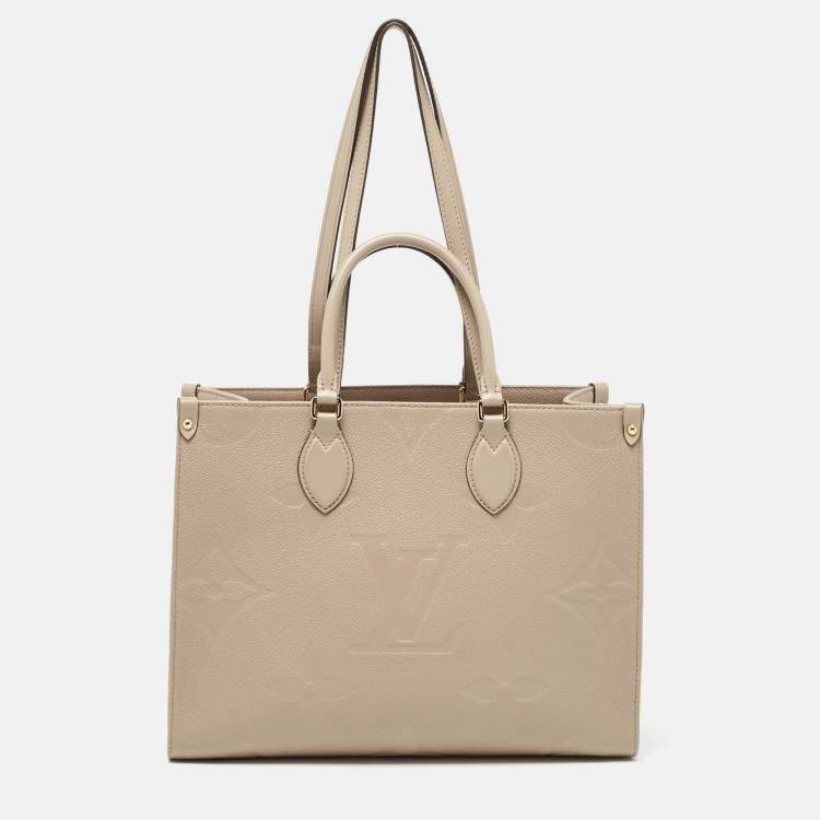 Pre Owned Louis Vuitton Beige Monogram Empriente Leather Giant Onthego MM Bag