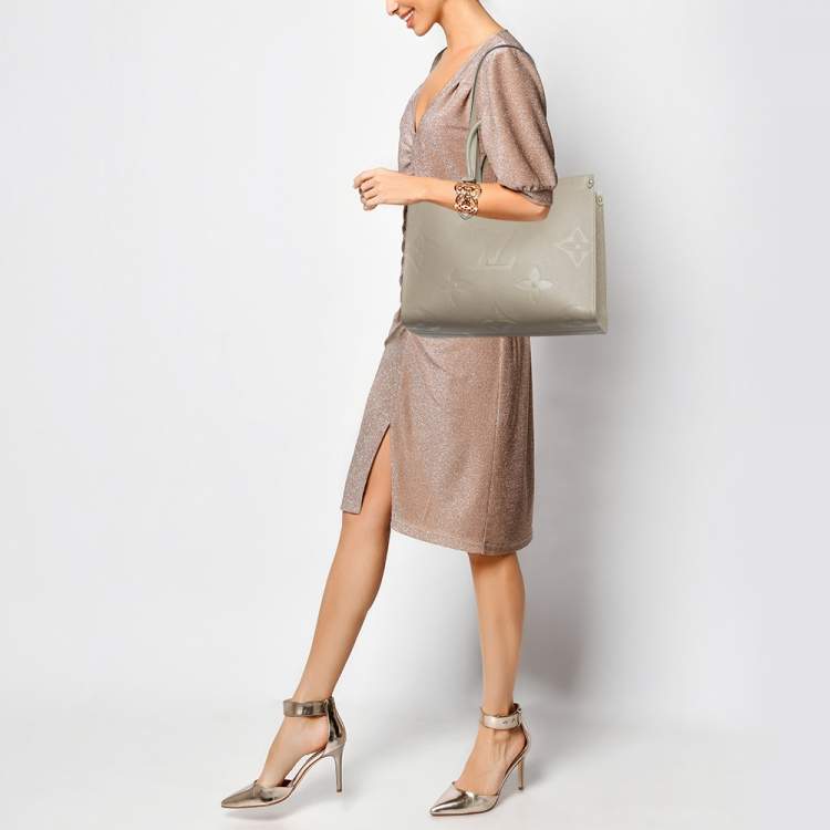 Pre Owned Louis Vuitton Beige Monogram Empriente Leather Giant Onthego MM Bag