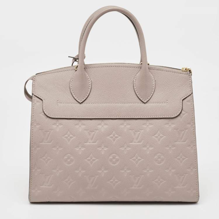 Pre Owned Louis Vuitton Beige Monogram Empreinte Leather Pont Neuf MM Bag