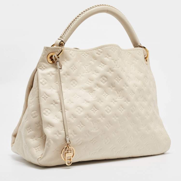 Pre Owned Louis Vuitton Neige Monogram Empreinte Leather Artsy MM Bag