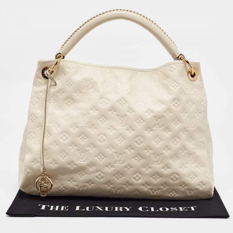 Pre Owned Louis Vuitton Neige Monogram Empreinte Leather Artsy MM Bag