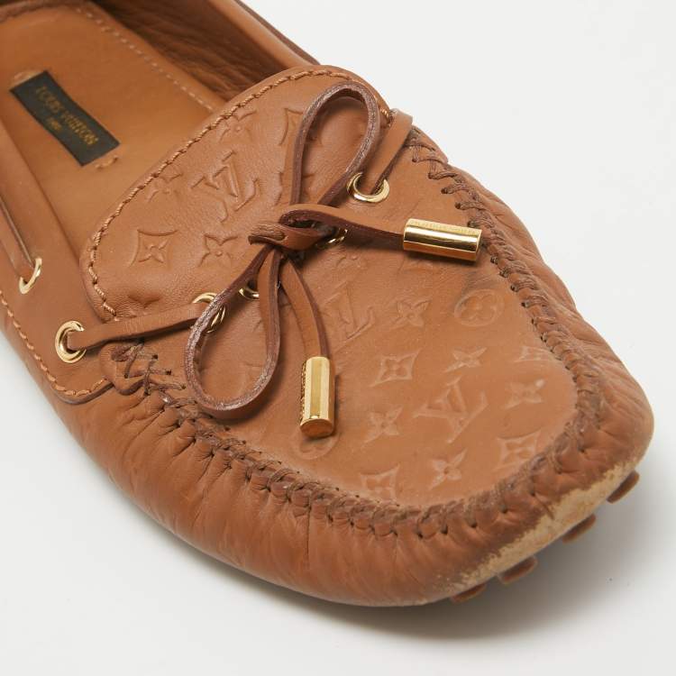 Pre Owned Louis Vuitton Brown Monogram Empreinte Leather Gloria Loafers Size 38.5