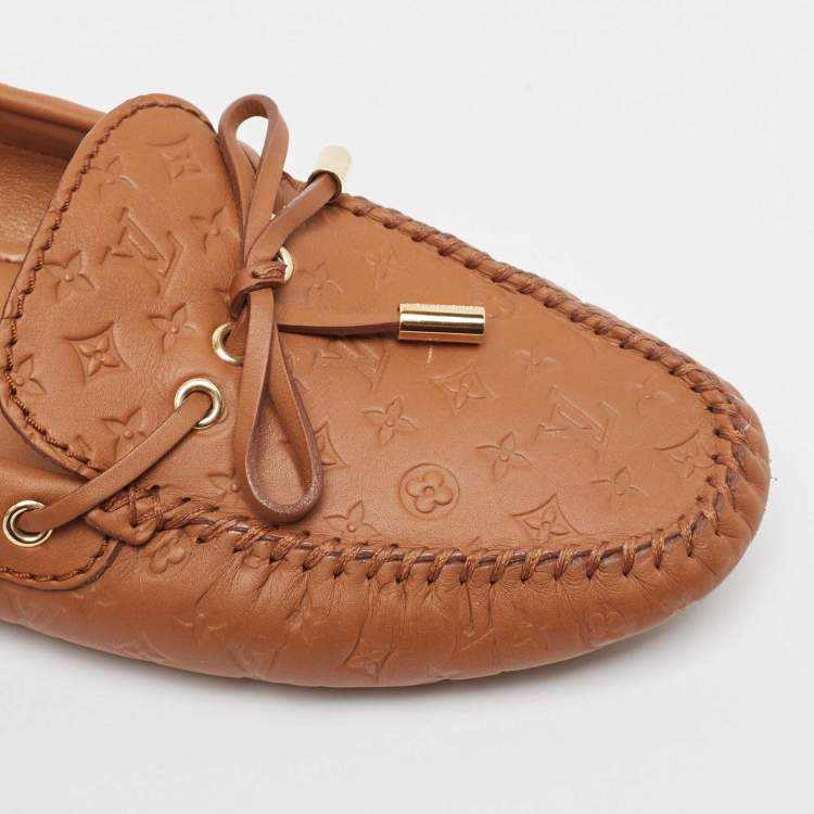 Pre Owned Louis Vuitton Brown Monogram Empreinte Leather Gloria Loafers Size 39