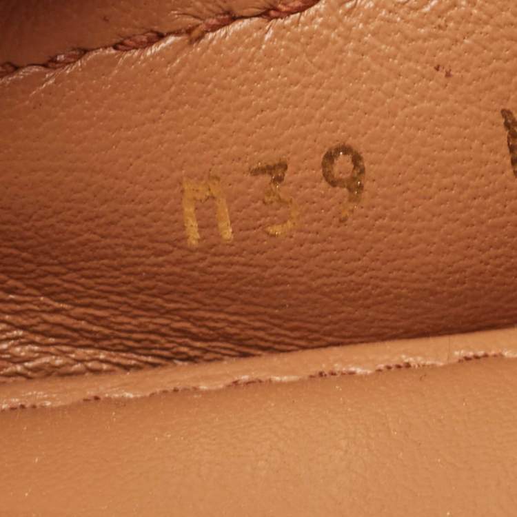Pre Owned Louis Vuitton Brown Monogram Empreinte Leather Gloria Loafers Size 39
