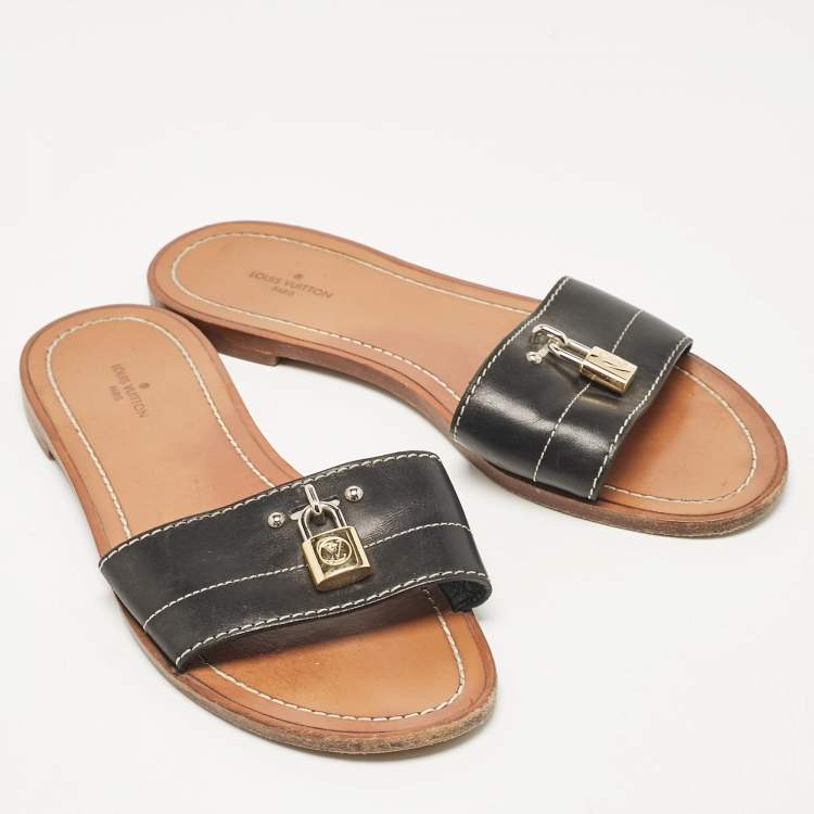 Pre Owned Louis Vuitton Black Leather Lock It Slide Flats Size 37